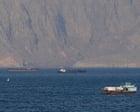 Middle East crisis live: ships report attacks as Iran closes strait of Hormuz; Trump says deal still possible