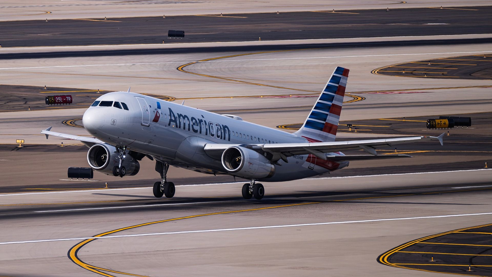 American Airlines Pilot Says Unruly Passenger Bit Fellow Flyer Before Landing In Philadelphia